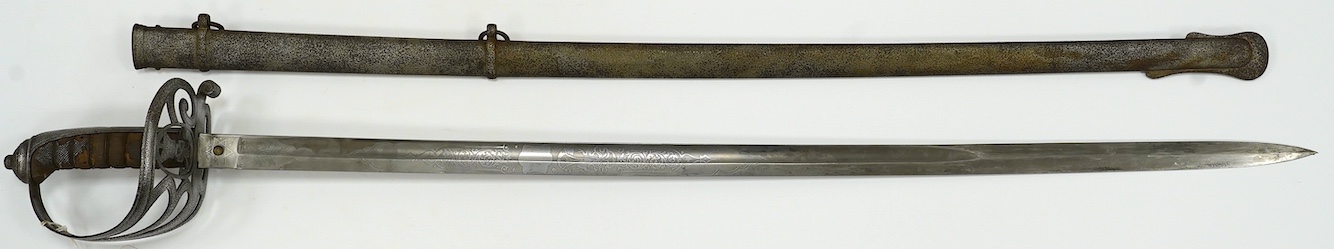 An 1827 pattern Victorian Rifle Officer’s sword, the blade etched with crowned VR and bugle, regulation hilt and scabbard, blade 82.5cm. Condition - poor